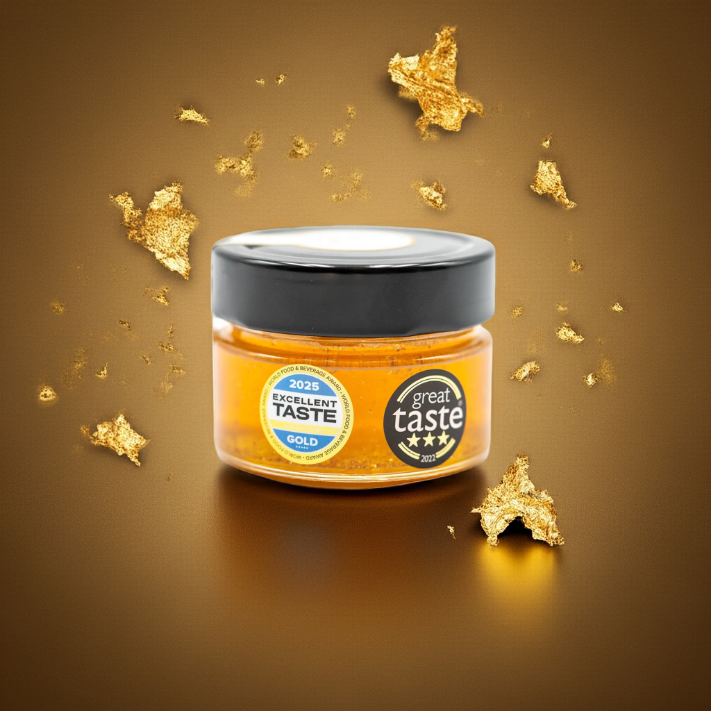 Honig mit essbarem 24-karätigem Blattgold